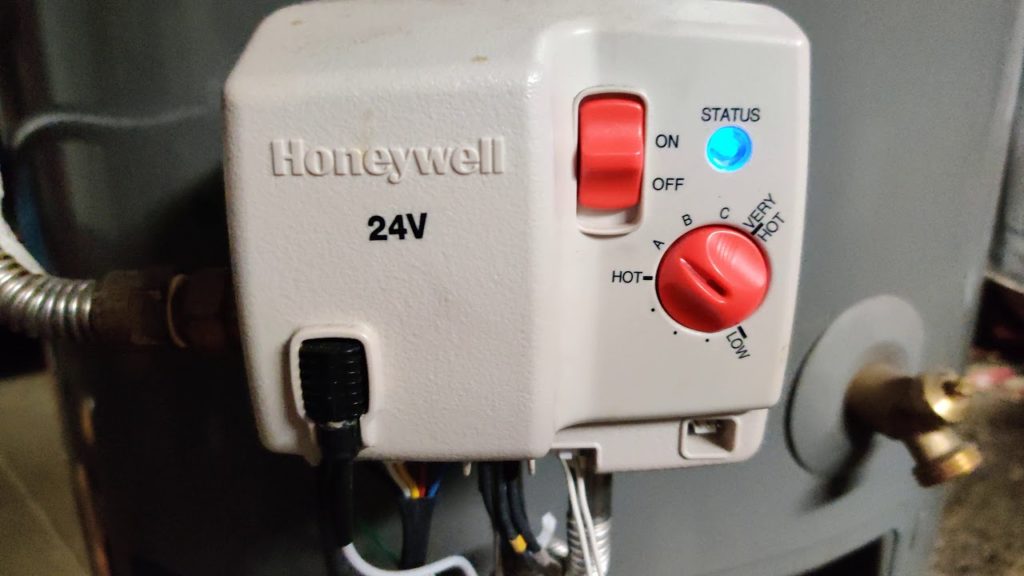 How do I reset my Rheem water heater?