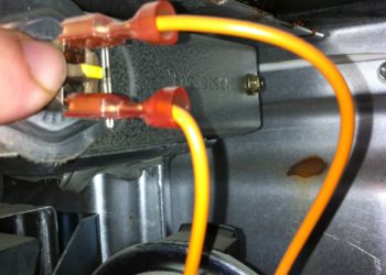 Where is the reset button on a Miller furnace?