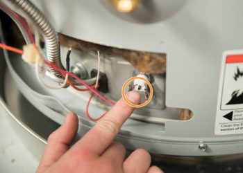 how to replace reset button on water heater