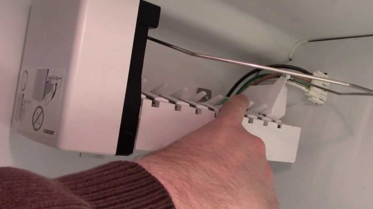 How do I reset my KitchenAid ice maker?