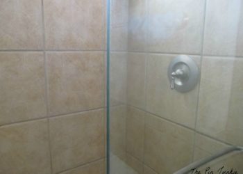 What can I put in shower doors to repel water?