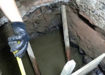 pouring concrete in standing water