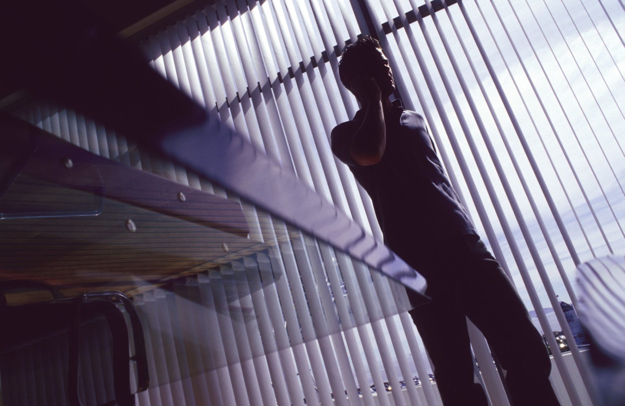 How do vertical blinds open and close?