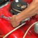 How do you adjust the deck on a Troy Bilt Bronco?