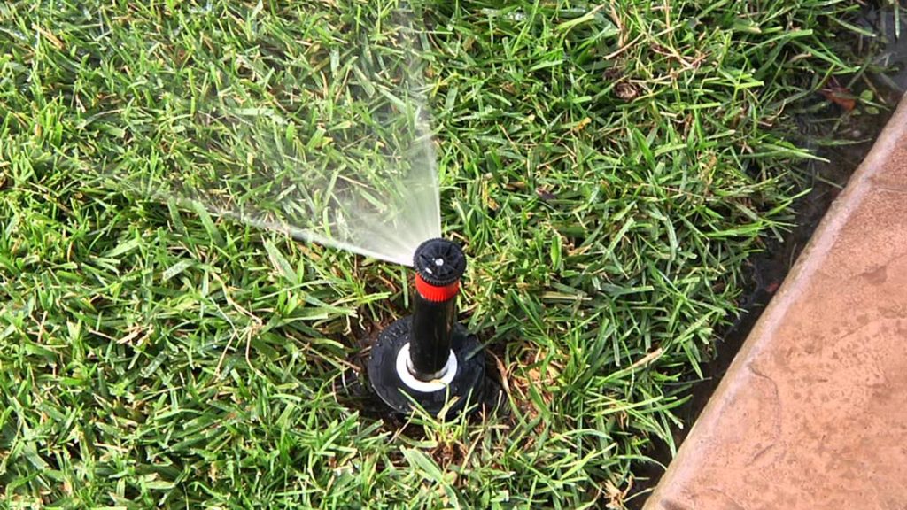 How do you adjust a sprinkler valve?