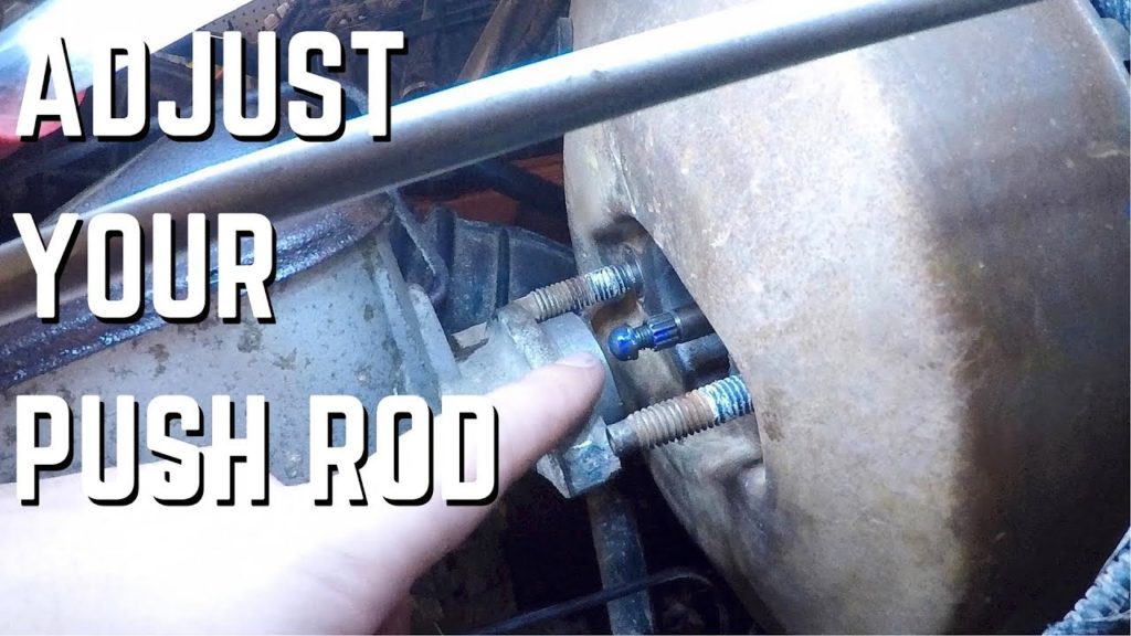 How do you adjust the pushrod length on a master cylinder?