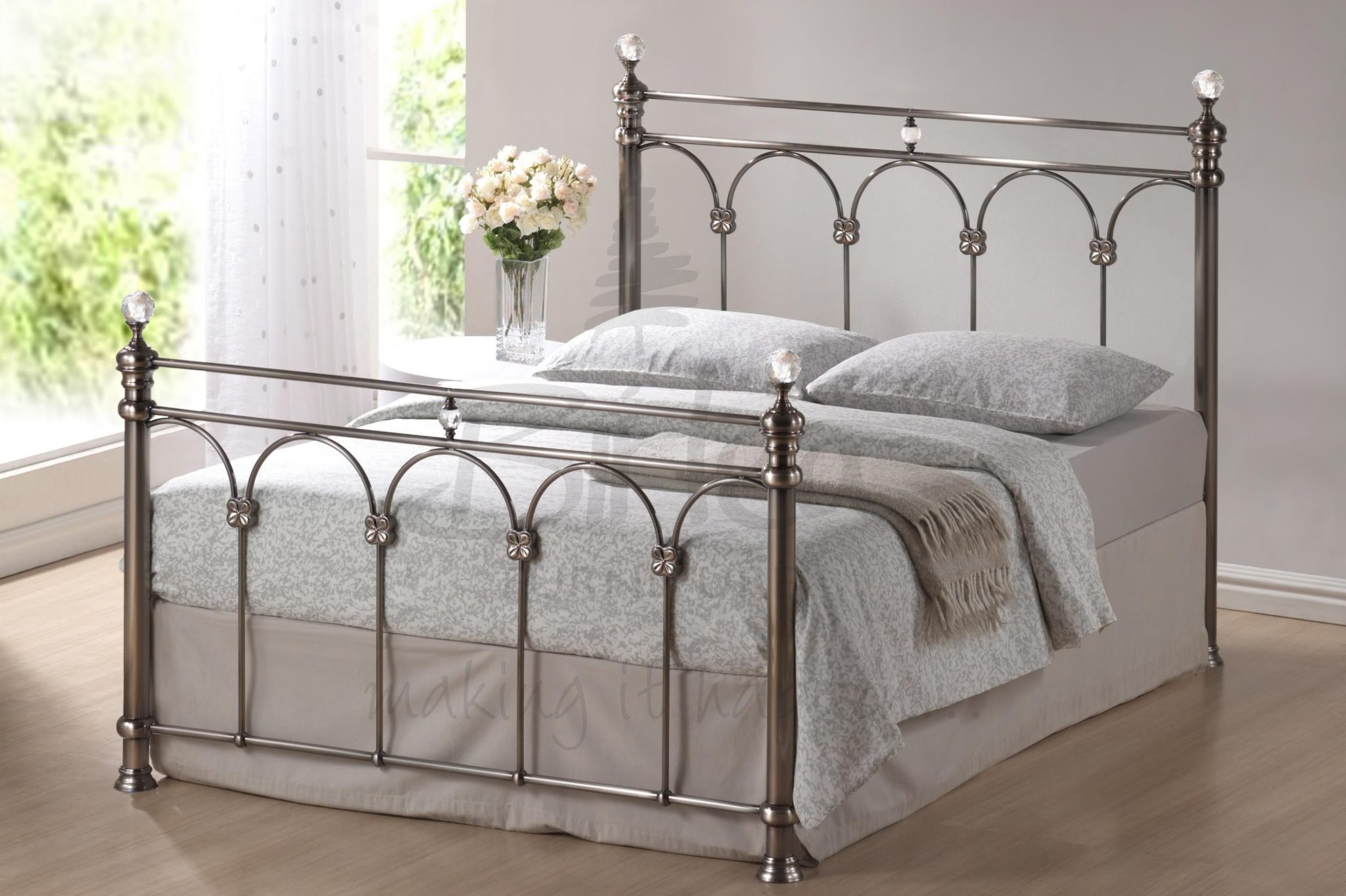 How do you assemble a queen metal bed frame?