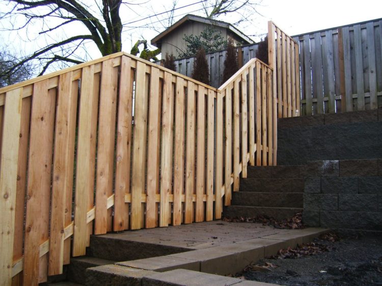 how to install wooden fence posts on concrete