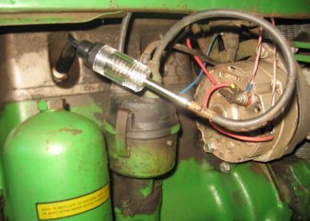 What spark plug does a John Deere d110 take?