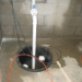How do you seal a sump pump lid?