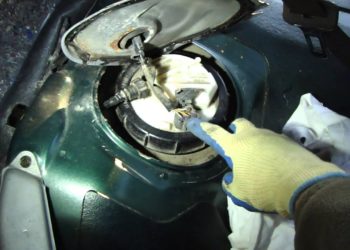 Where is the fuel pump on a 1990 Toyota Corolla?