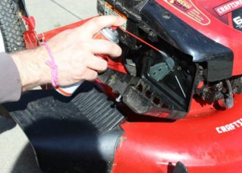 How do you clean a carburetor on a riding lawn mower?