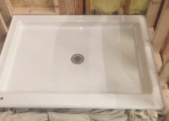 Who makes cast iron shower pans?