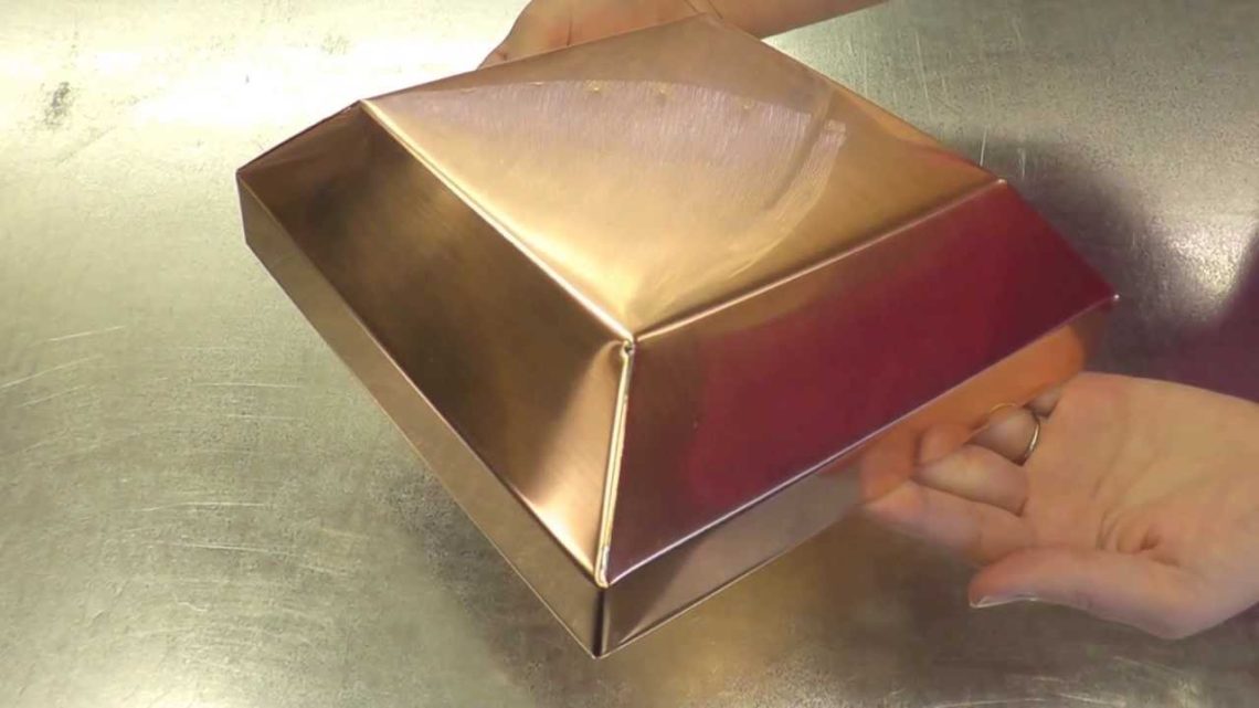 How do you clean copper fence post caps?