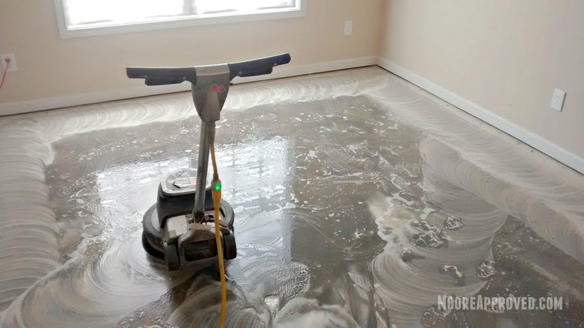 How do you clean drywall dust off concrete floor?