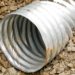 how to clear corrugated drain pipe