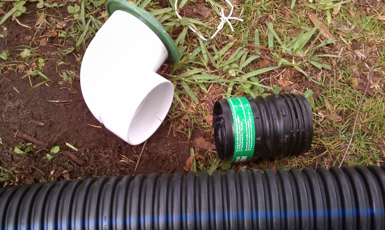 How do you attach corrugated pipe to PVC pipe?