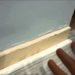how to fill gap between baseboard and wall