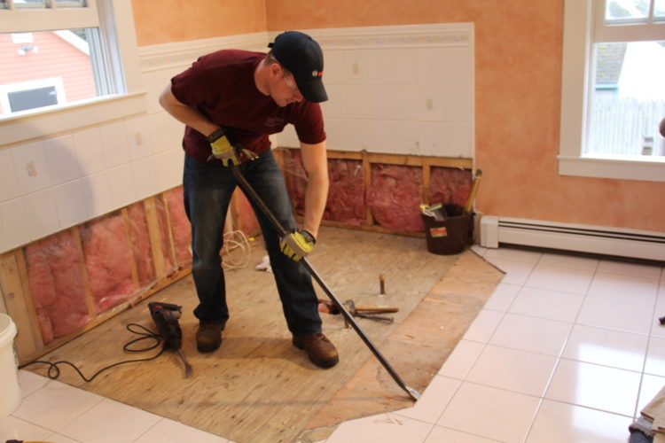 How do I remove a chipped tile?