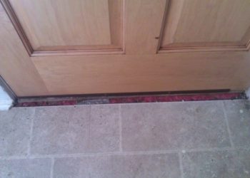 How do you fill the gap between doors and floors?