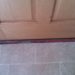 How do you fill the gap between doors and floors?