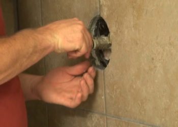What would make a shower valve hard to turn?