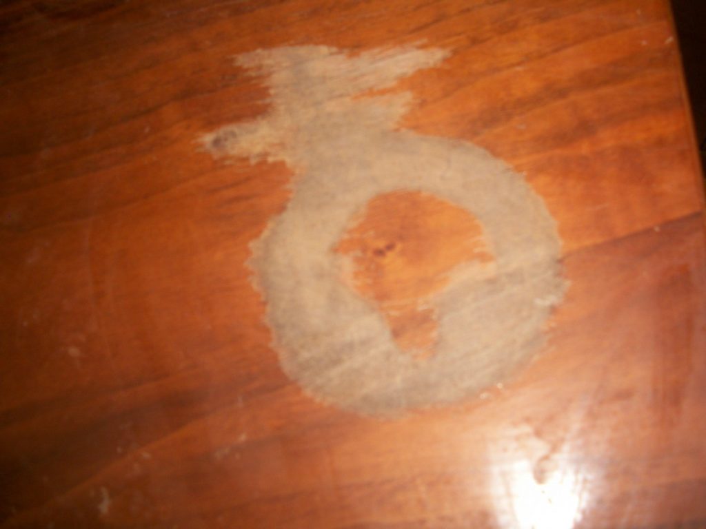 How do you fix a water damaged wood table top?