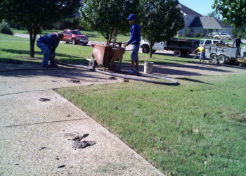 grinding concrete sidewalk