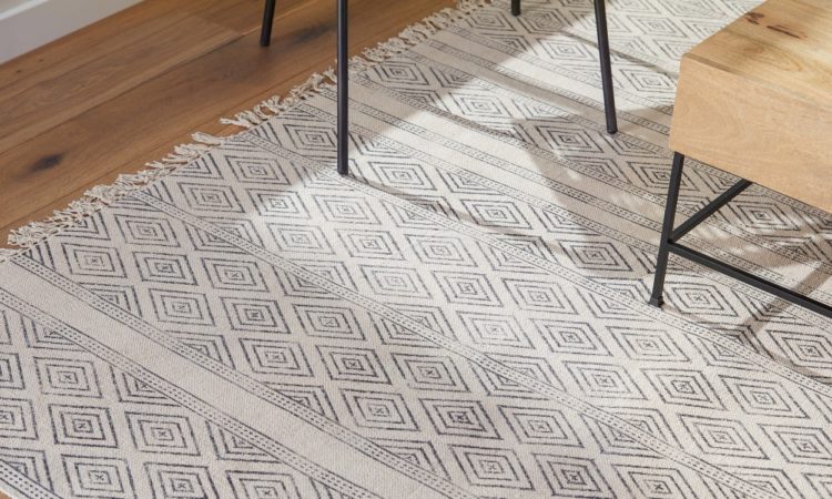 how to get an area rug to flatten out