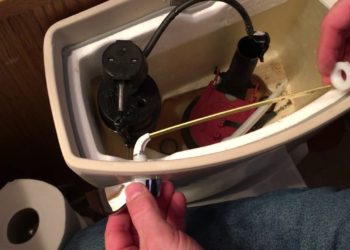 how to flush toilet without handle