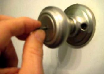 How do you unlock a bathroom door from the outside?