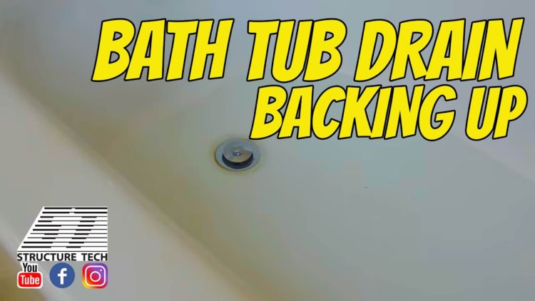 tub backing up