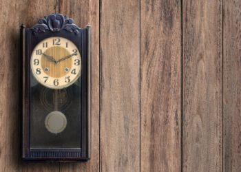 how to hang heavy clock