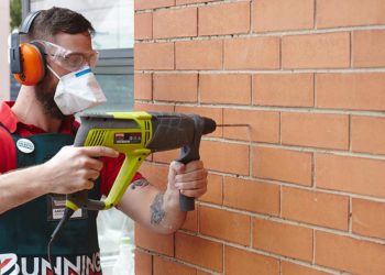 how to drill into brick to hang something