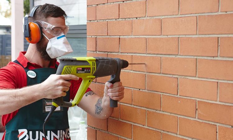 how to drill into brick to hang something