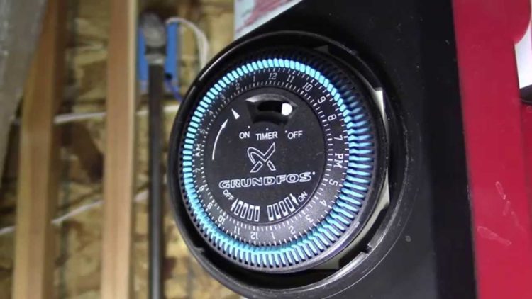 How do you set a Grundfos pump timer?
