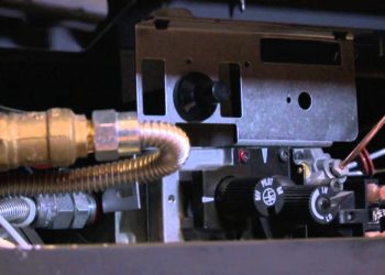 How do you light the pilot on a Heat and Glo fireplace?