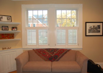 How do you darken a room with plantation shutters?