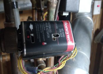 How do you manually override a zone valve?