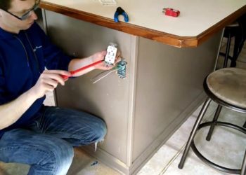 How do you add an outlet to a kitchen island?