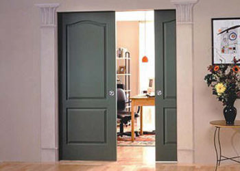 How do you raise a pocket door?