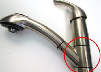 Why is my kitchen faucet leaking from the handle?