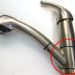 Why is my kitchen faucet leaking from the handle?