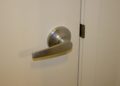 how to remove a lever door handle without screws