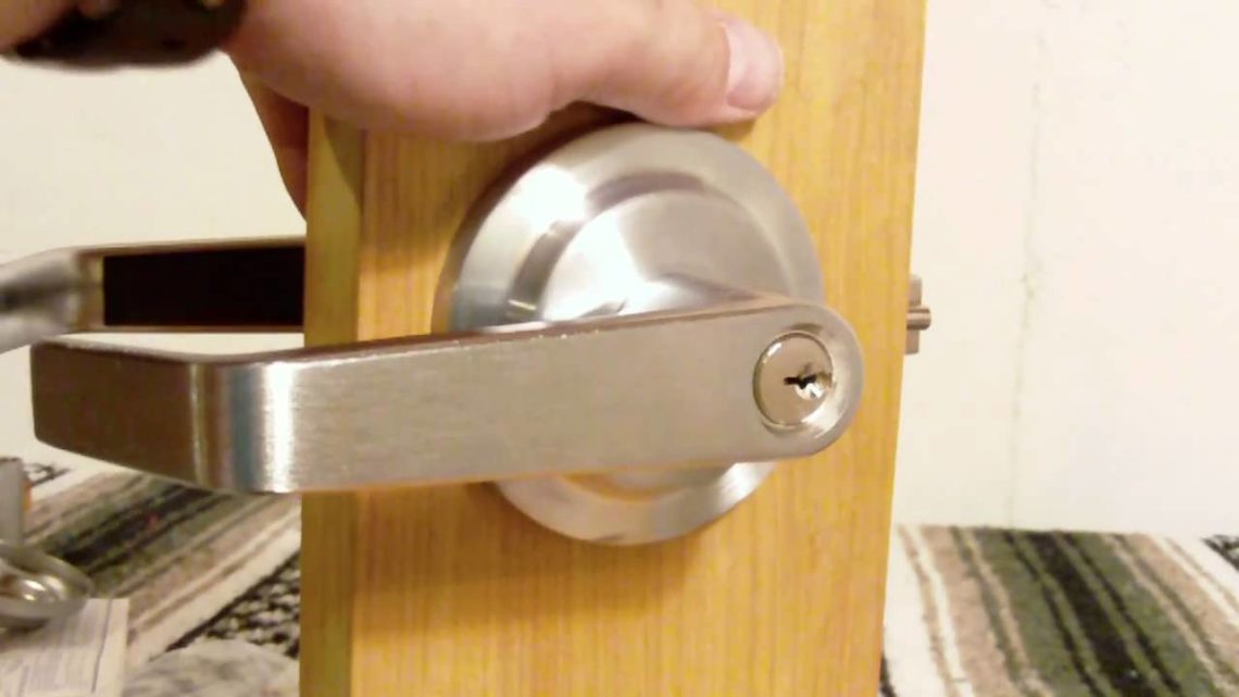 How do you remove a screwless door handle?