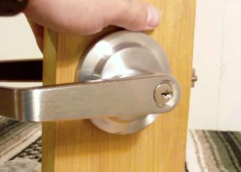 how to take a commercial door handle off