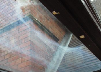 removing lead flashing stains from glass