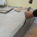 removing tile adhesive from front of tiles
