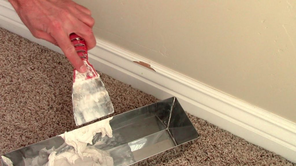 How do you remove water stains from baseboards?