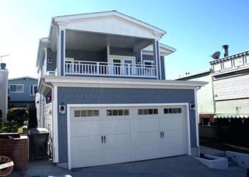 How much does it cost to add a window to a garage door?